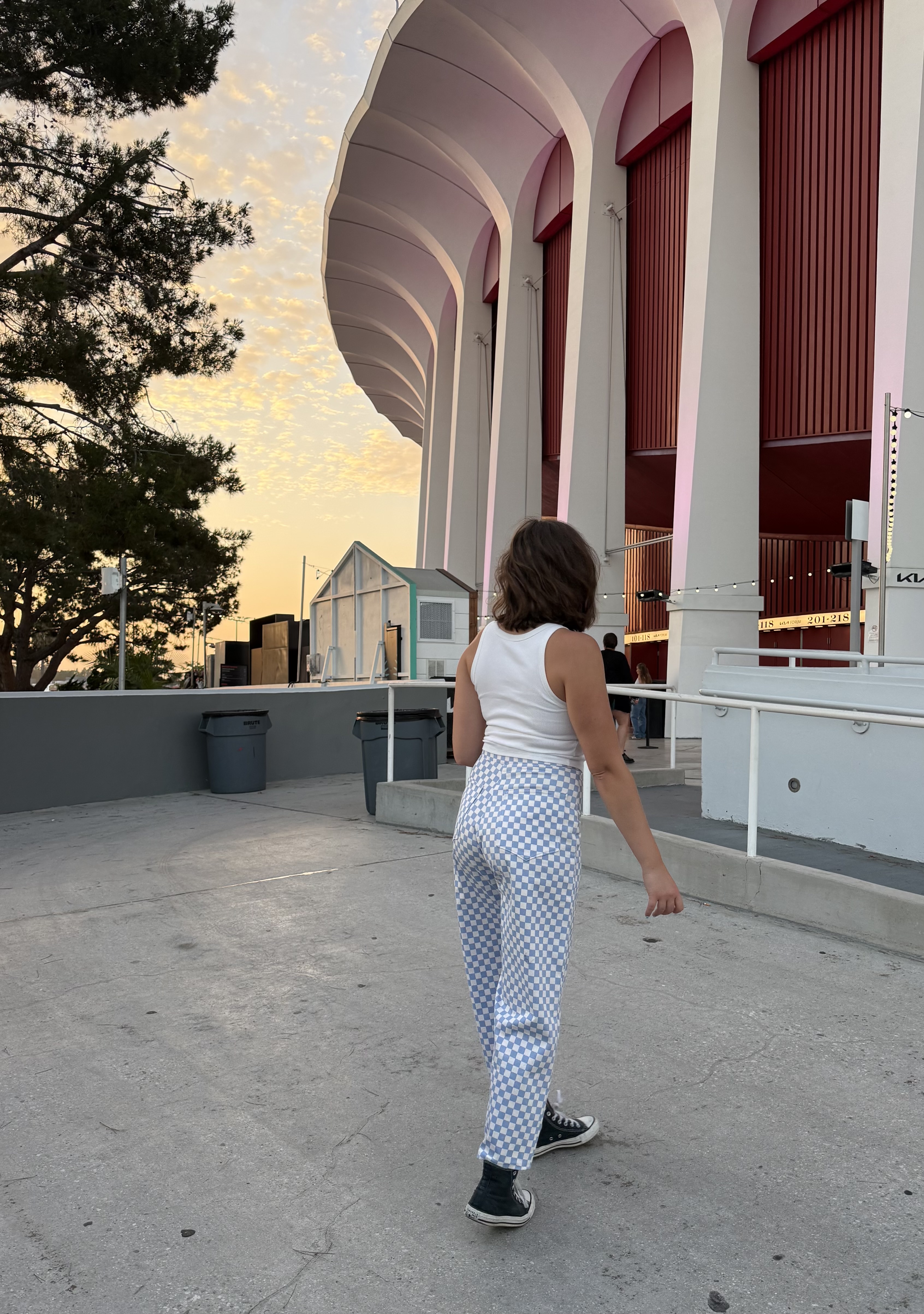 Emily wearing the finished Maple Culottes, back view, checks lined up across the seams